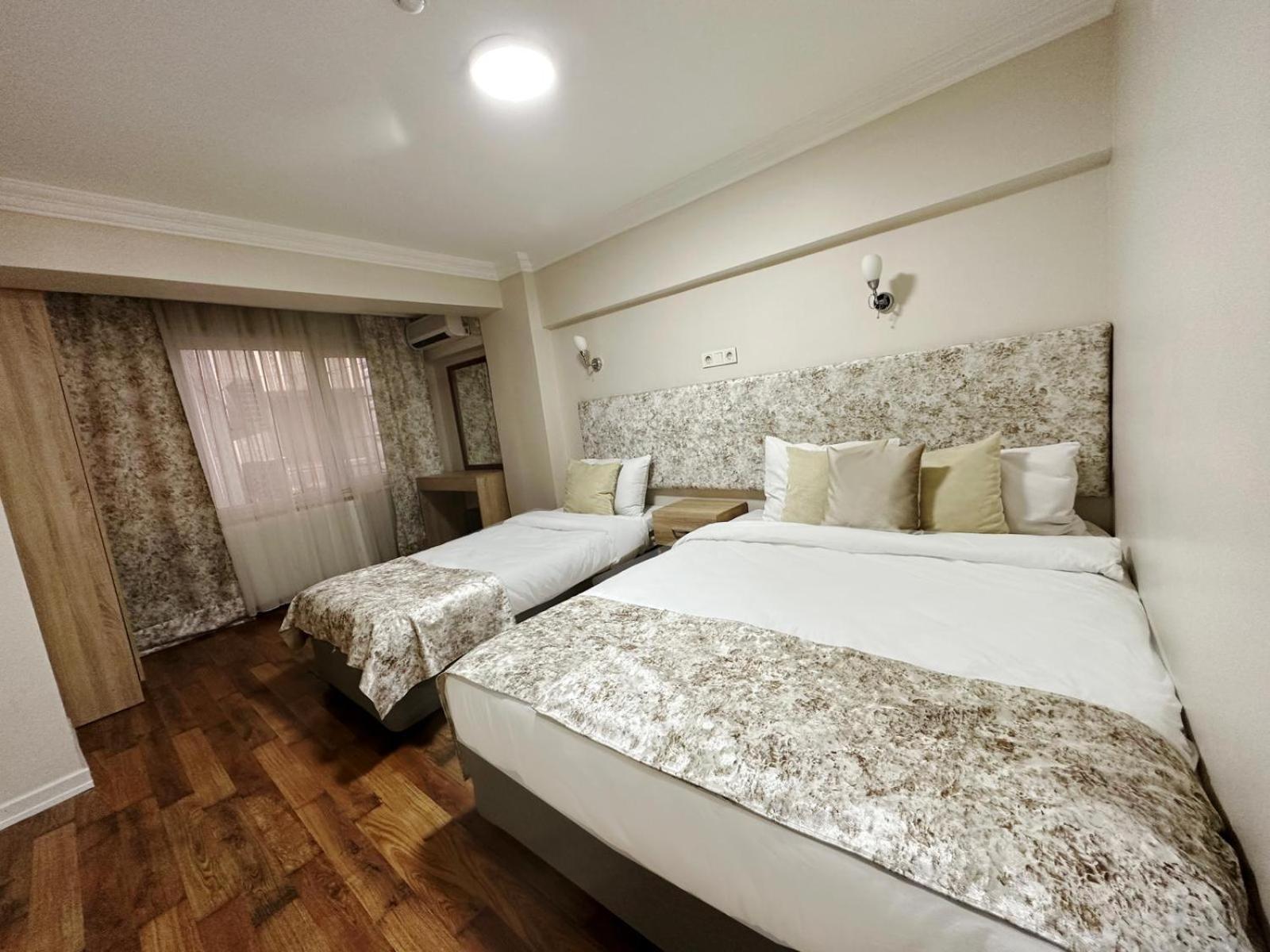 Deluxe Dreibettzimmer
